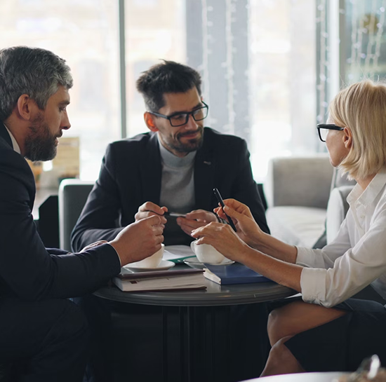 Three people discussining loans